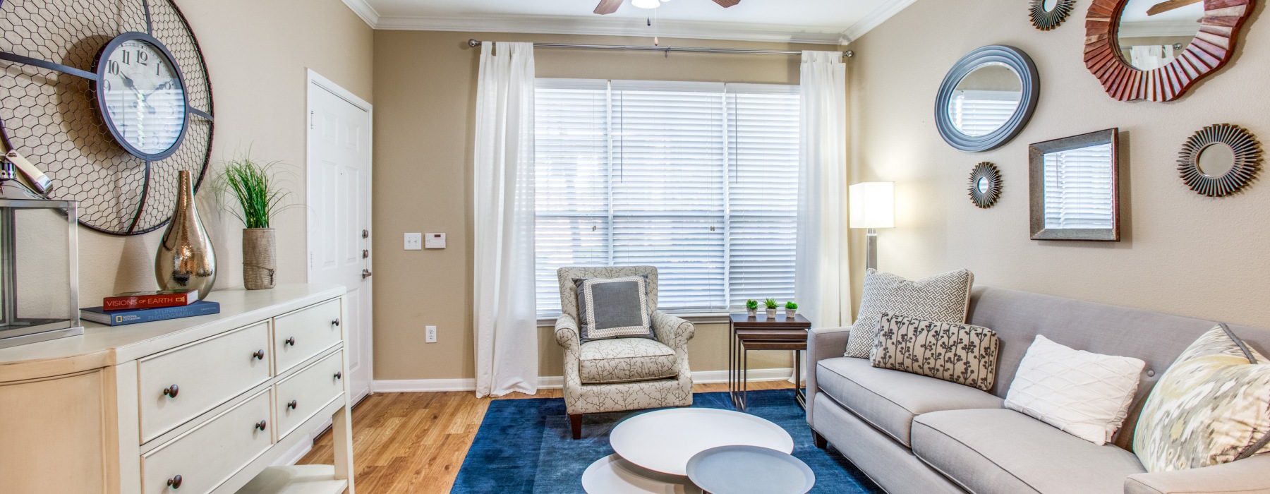 Spacious living area with plenty of natural light and room to relax